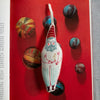 Skippy Cotton Garden Gnome - Lavender Scented Token (1 pc) - product shown on red book.