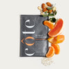 Cote Re-Treat Detox Body Polish (3 x 44 ml) - product shown surrounded by ingredients.
