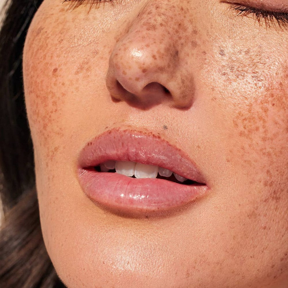 Cote The Ritual Peptide Enriched Lip Treatment (10 ml)  - product shown on model's lips.