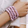 Slip Pure Silk Skinny Scrunchies - Wildflower (4 pcs) - product shown on model's wrists.