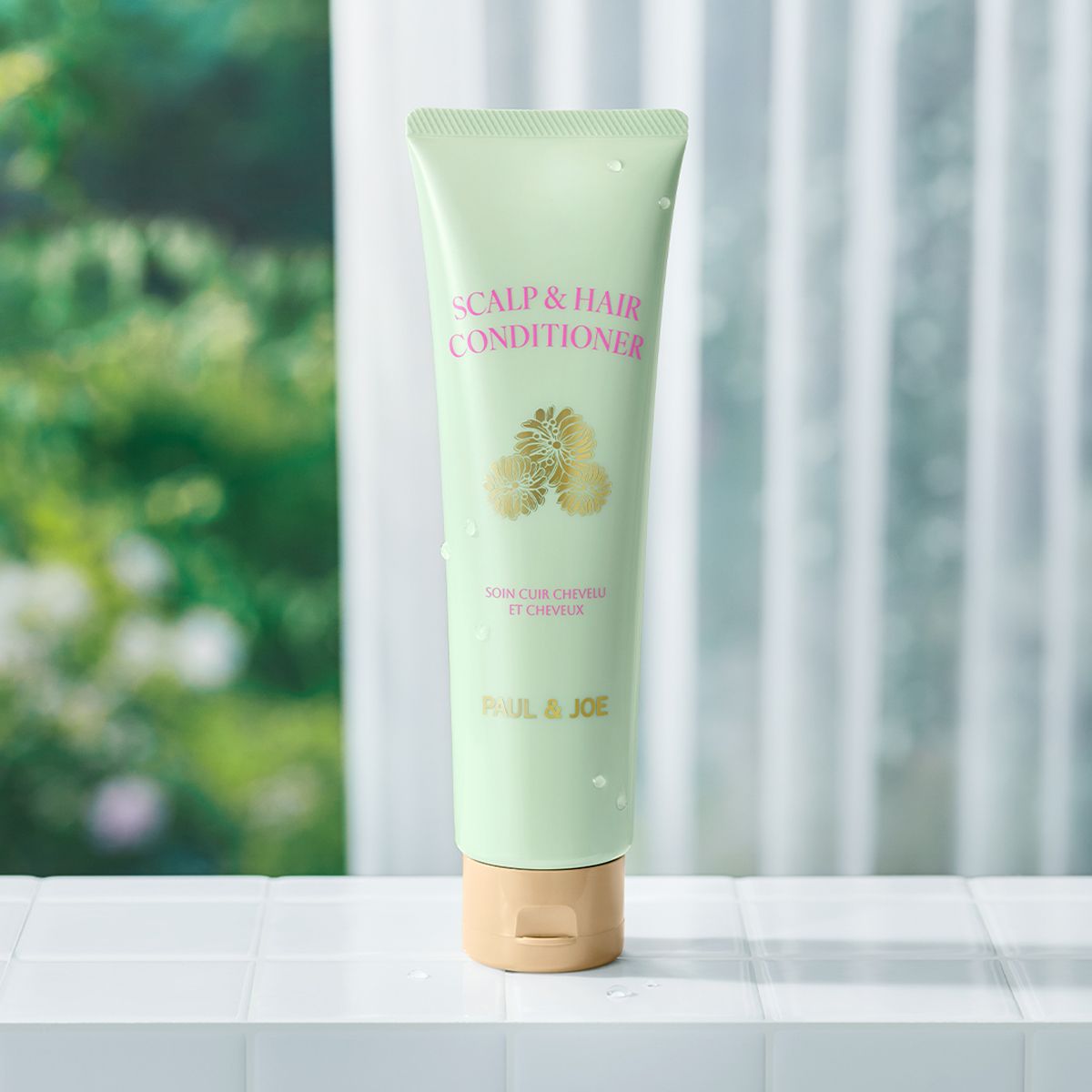 Paul &amp; Joe Beaute Scalp &amp; Hair Conditioner (200 ml) - product shown on tile.