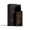 Heretic Parfum Haxan Body Oil (150 ml) - product shown next to packaging. 