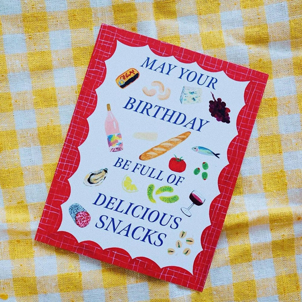 Small Adventure Delicious Snacks Birthday Card (1 pc) - product shown on yellow gingham. 