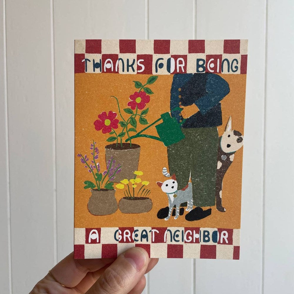 Small Adventure Great Neighbor Card (1 pc) - product shown being held in front of white wall. 