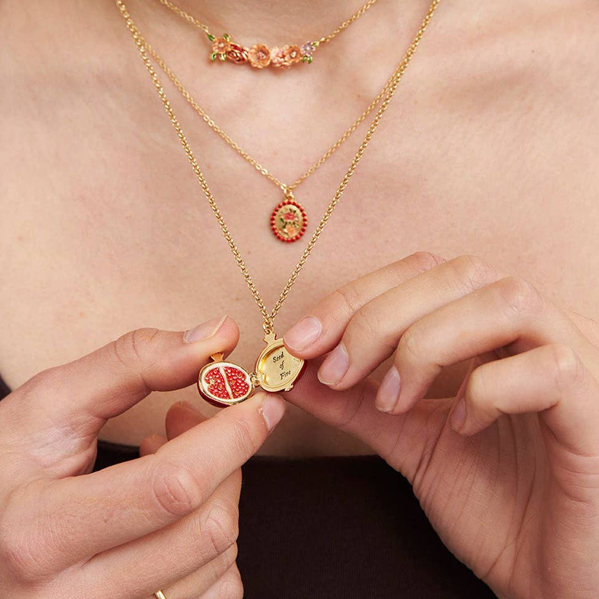 Fable England Pomegranate Locket Necklace (1 pc) - product shown being opened.