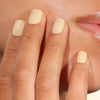 Londontown Magnolia Bakery x Londontown Nail Polish - Banana Pudding (12 ml) - product shown on nails. 
