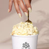 Londontown Magnolia Bakery x Londontown Nail Polish - Banana Pudding (12 ml) - product lifestyle shot. 
