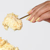 Londontown Magnolia Bakery x Londontown Nail Polish - Banana Pudding (12 ml) - product lifestyle shown. 