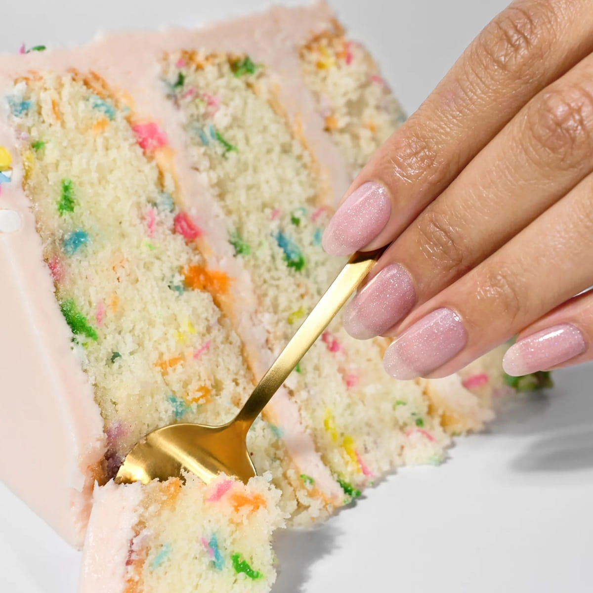 Londontown Magnolia Bakery x Londontown Nail Polish - Confetti Cake (12 ml) - product lifestyle shot.