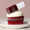 Londontown Magnolia Bakery x Londontown Nail Polish - Red Velvet (12 ml) - product shown on top of cupcake. 