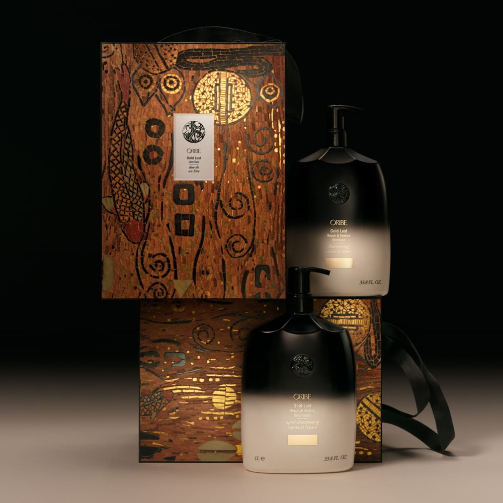 Oribe Gold Lust Liter Duo (2 x 1 L) - product shown on top of packaging. 