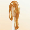Nuxe Reve de Miel Gold Honey Lip Care (10 ml) - product shown on applicator. 