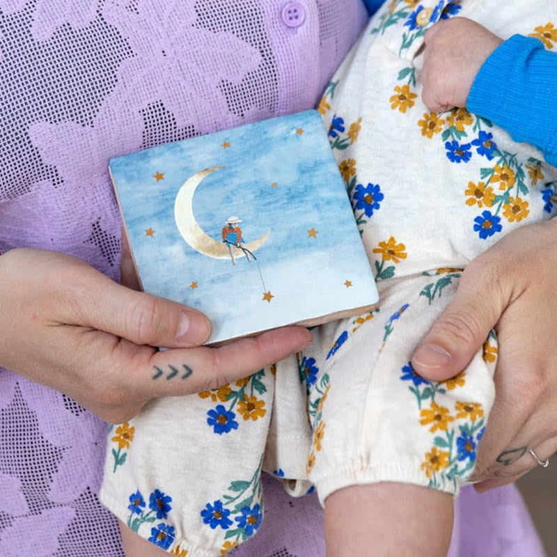 StoryTiles Small Tile - Catching Dreams (1 pc) - product shown being held. 