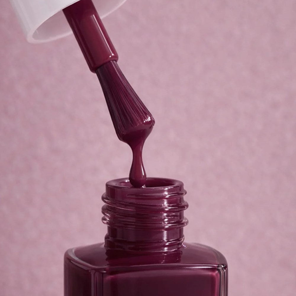 Kure Bazaar Nail Lacquer - Burgundy (10 ml) - product shown with lid removed.