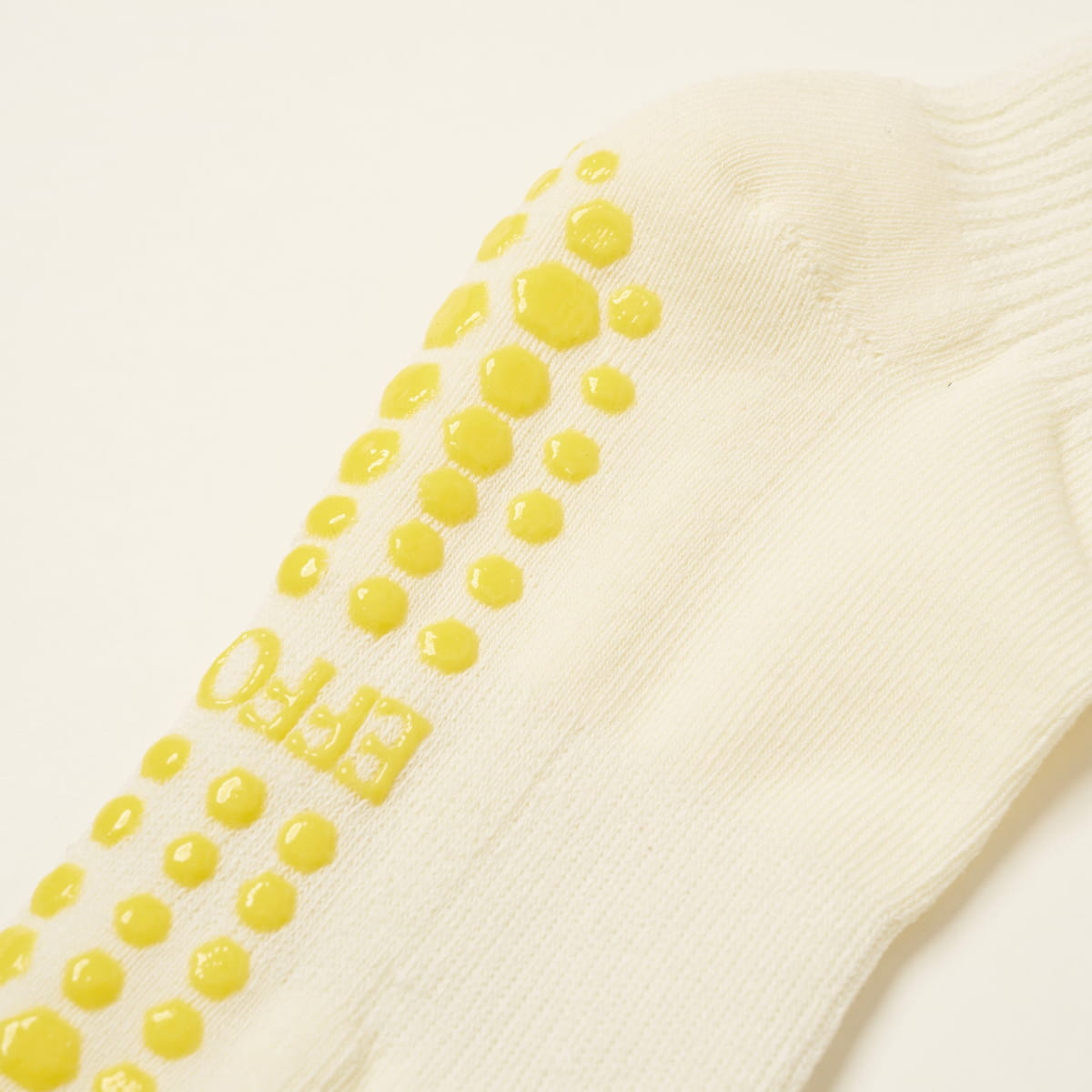 Effortless Club Lemon Ruffle Grip Sock (1 pair) - product shown up close.