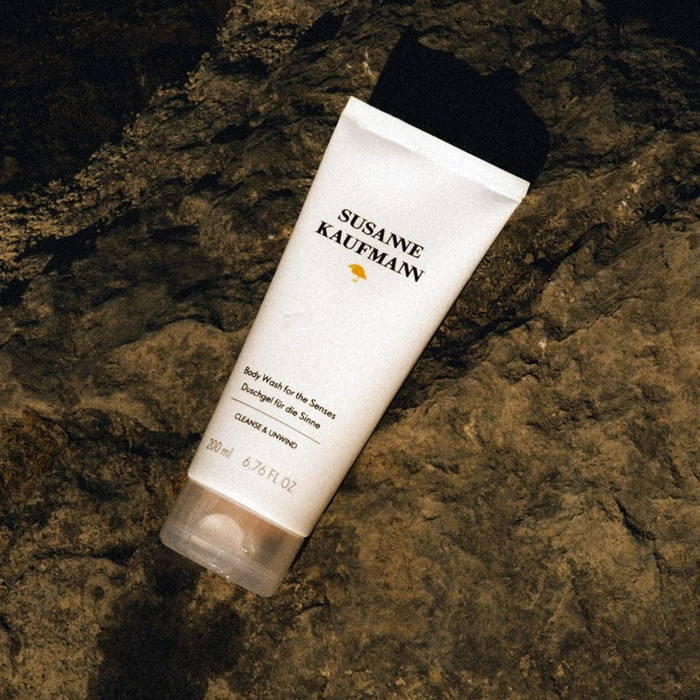 Susanne Kaufmann Body Wash for the Senses (200 ml) - product shown on a rock. 