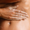 Susanne Kaufmann Body Scrub for the Senses (200 ml) - product shown being lathered.