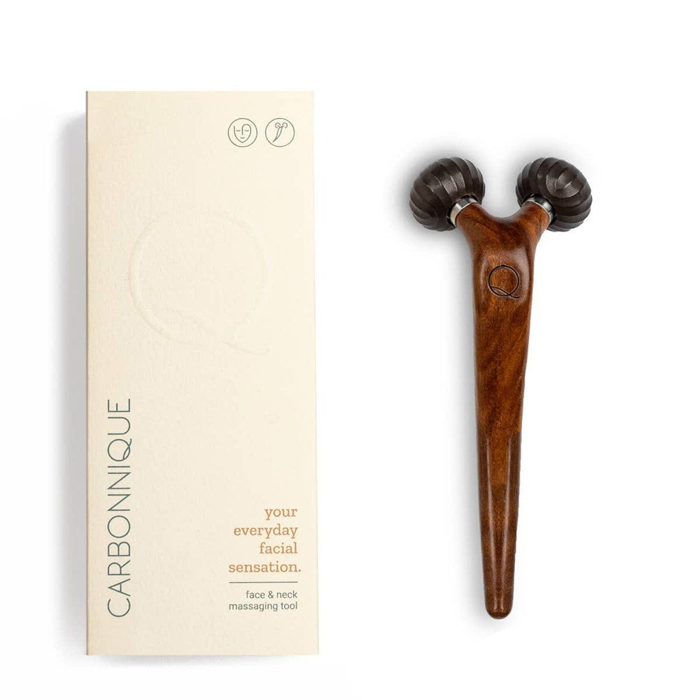 Carbonnique Face &amp; Neck Massaging Tool (1 pc) - product is shown next to packaging. 