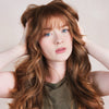 Rahua Classic Conditioner (275 ml) - model shown touching hair.
