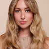 Rahua Enchanted Island Shampoo (275 ml) - model shown.