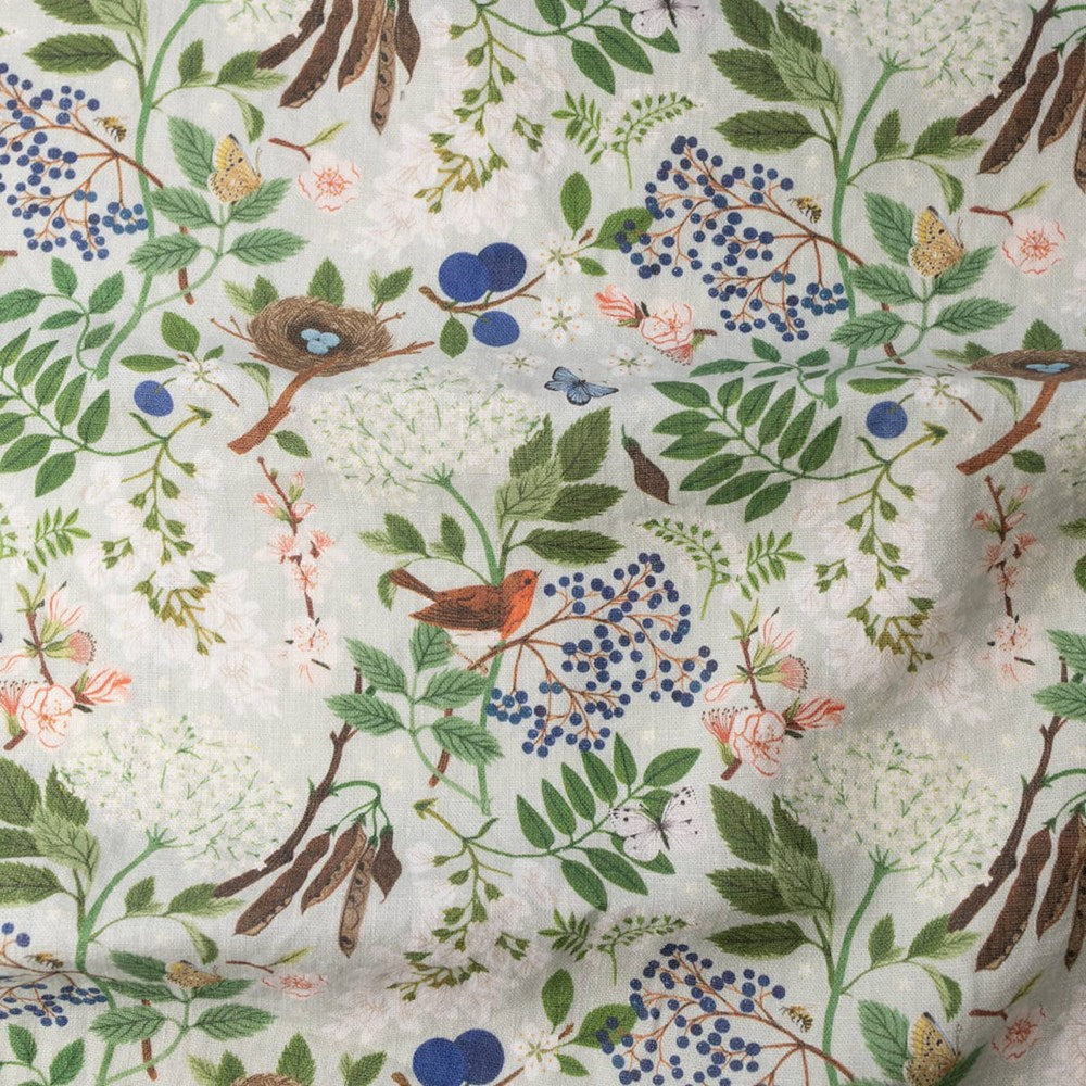 A close-up of Botanica Paper Co. Flowering Trees Tea Towel (1 pc)