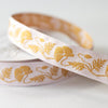 Close up detail of Botanica Paper Co. Gold Poppy Embroidered Ribbon (0.75” x 5 yards)