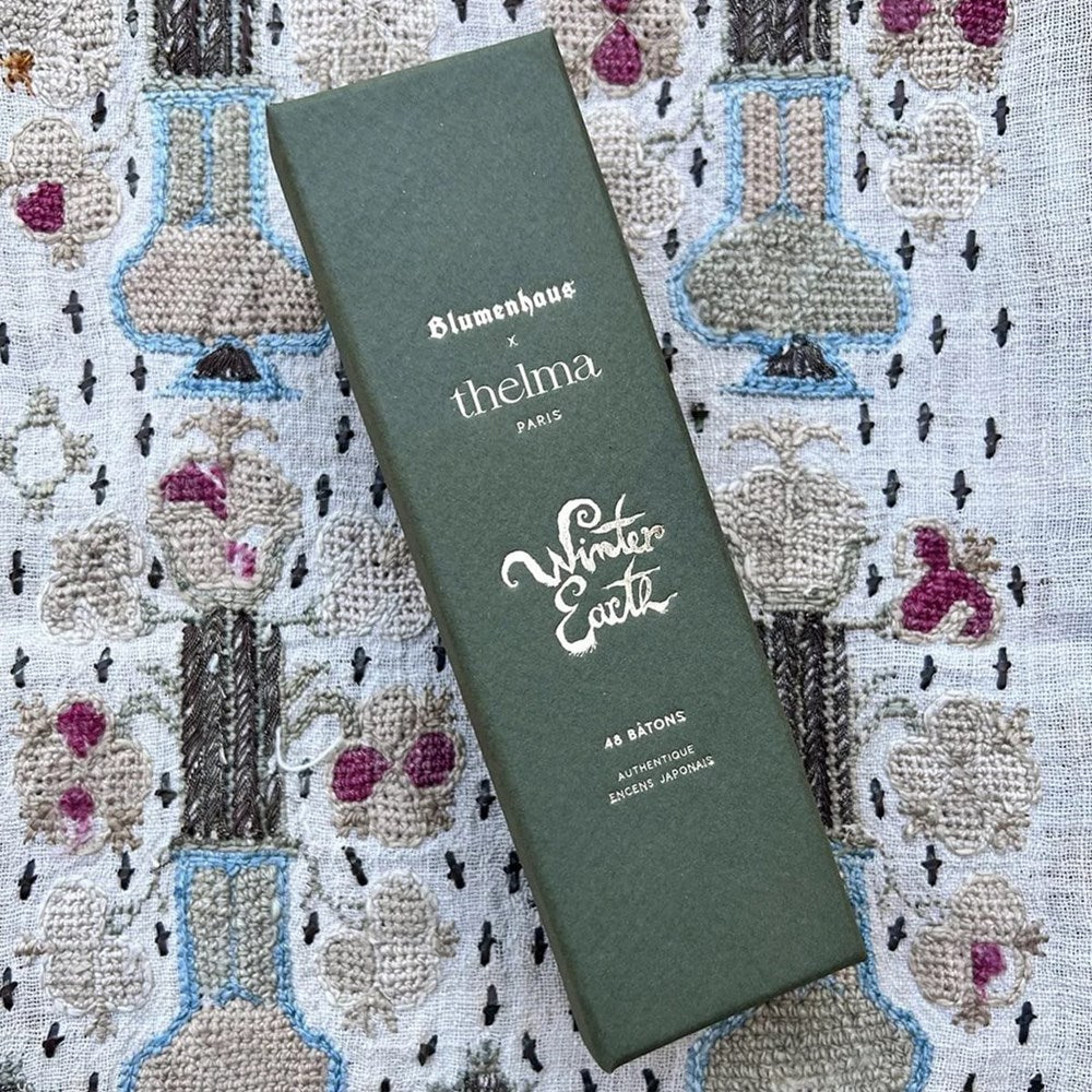 Lifestyle shot of Thelma Paris Winter Earth Incense Sticks (48 sticks) box