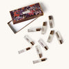 Fragonard Parfumeur Woman Eau de Toilette Set (10 x 4 ml) - product shown on creme background. 