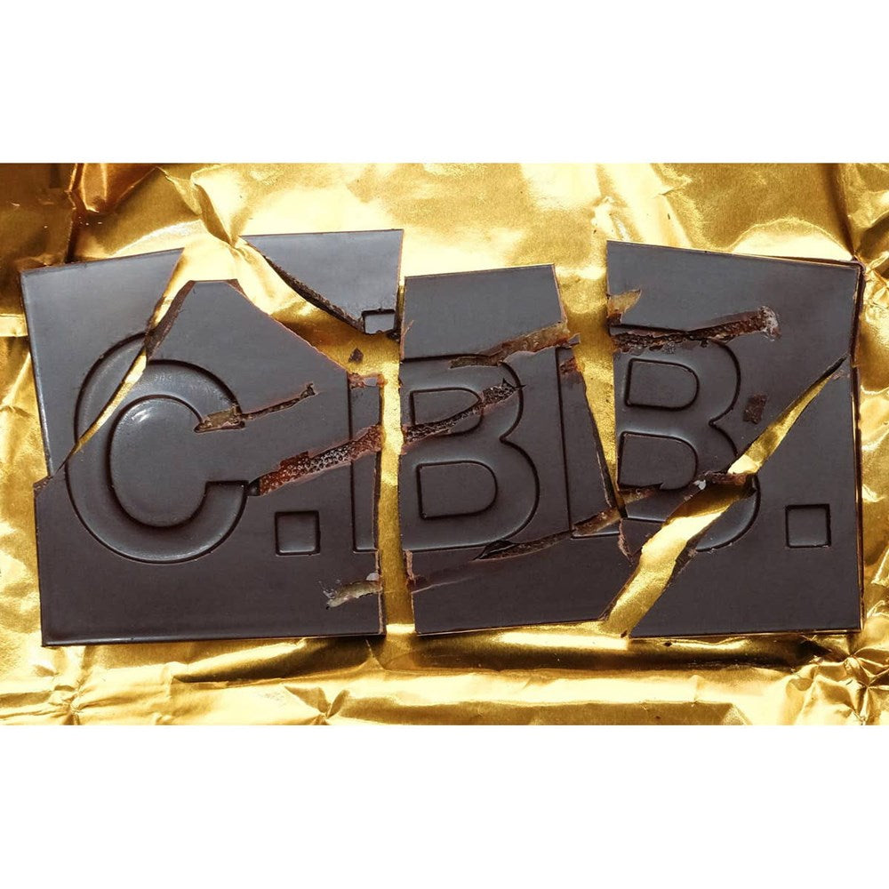 Casa Bosques Preserved Oranges Dark Chocolate Bar (60 g) - product shown out of packaging.