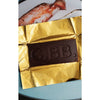Casa Bosques Sea Salt Dark Chocolate Bar (60 g) - product shown on gold foil. 