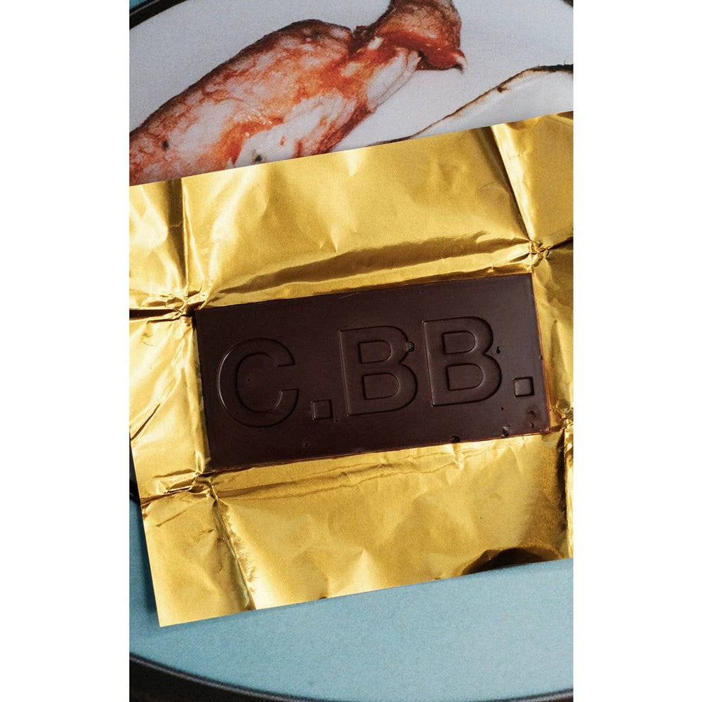 Casa Bosques Sea Salt Dark Chocolate Bar (60 g) - product shown on gold foil. 