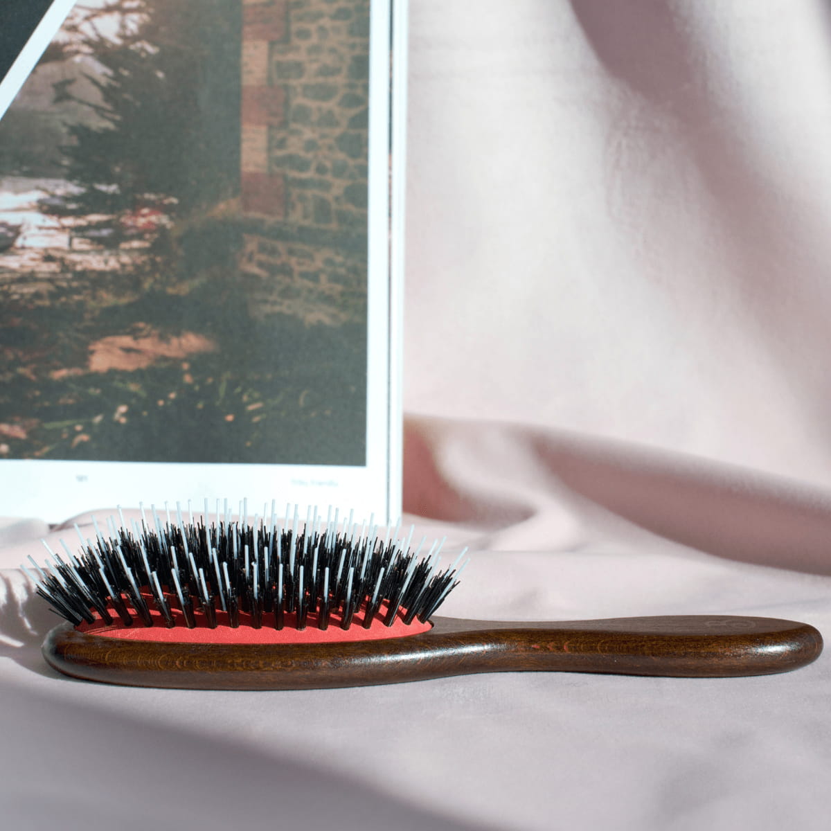 L'Artisan Brossier Pure Boar & Nylon Bristle Brush - Medium (1 pc) - product shown on pink background.