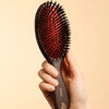L'Artisan Brossier Pure Boar Bristle Brush - Large (1 pc) - product shown on creme background.