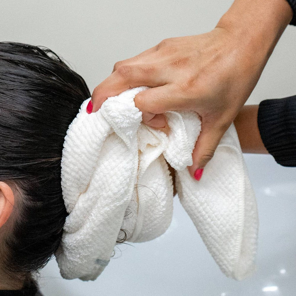 VOLO Beauty Hero Back Bar Hair Towel - Salt White (6 pcs) - product shown being used on hair