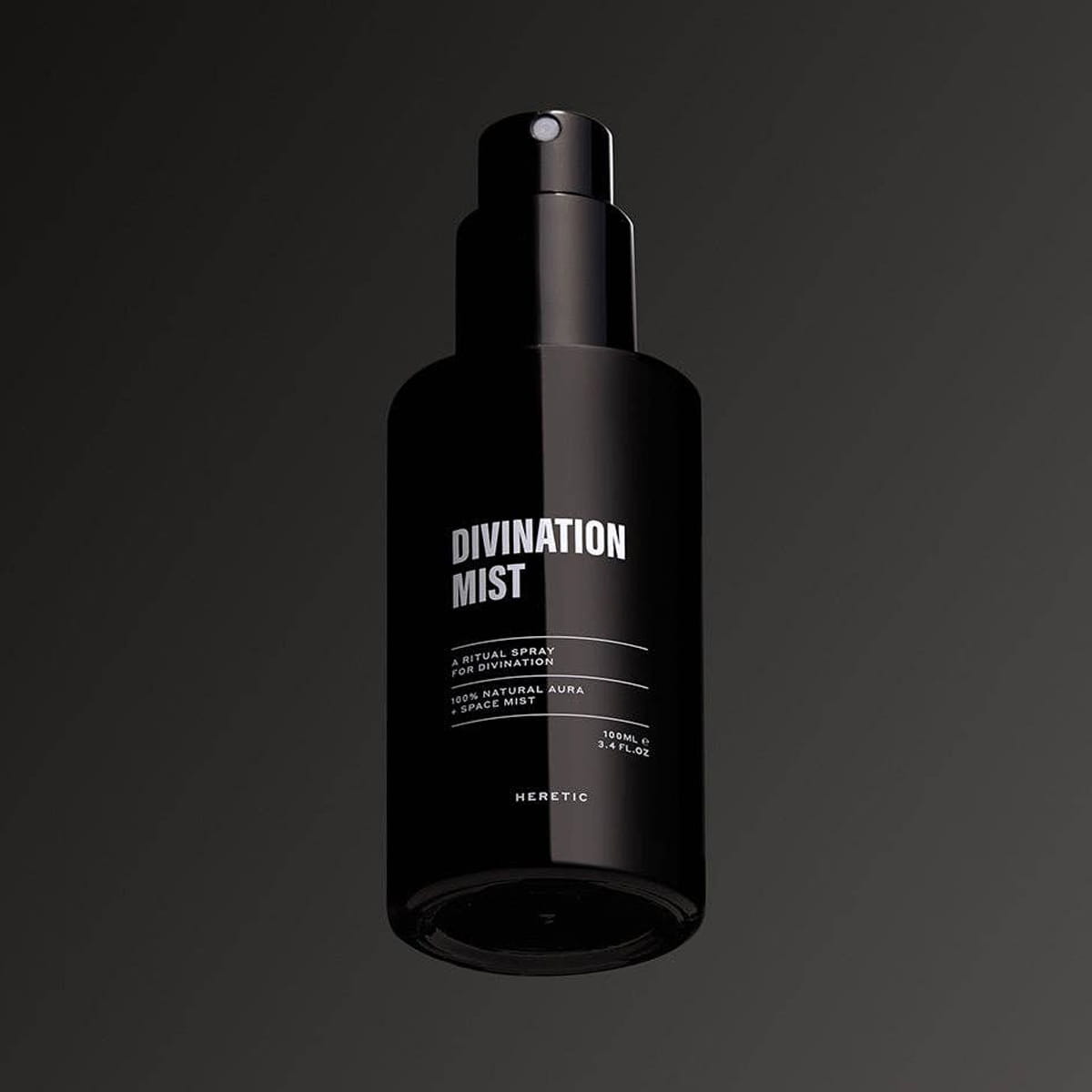 Heretic Parfum Divination Mist (100 ml) - product shown on black background.