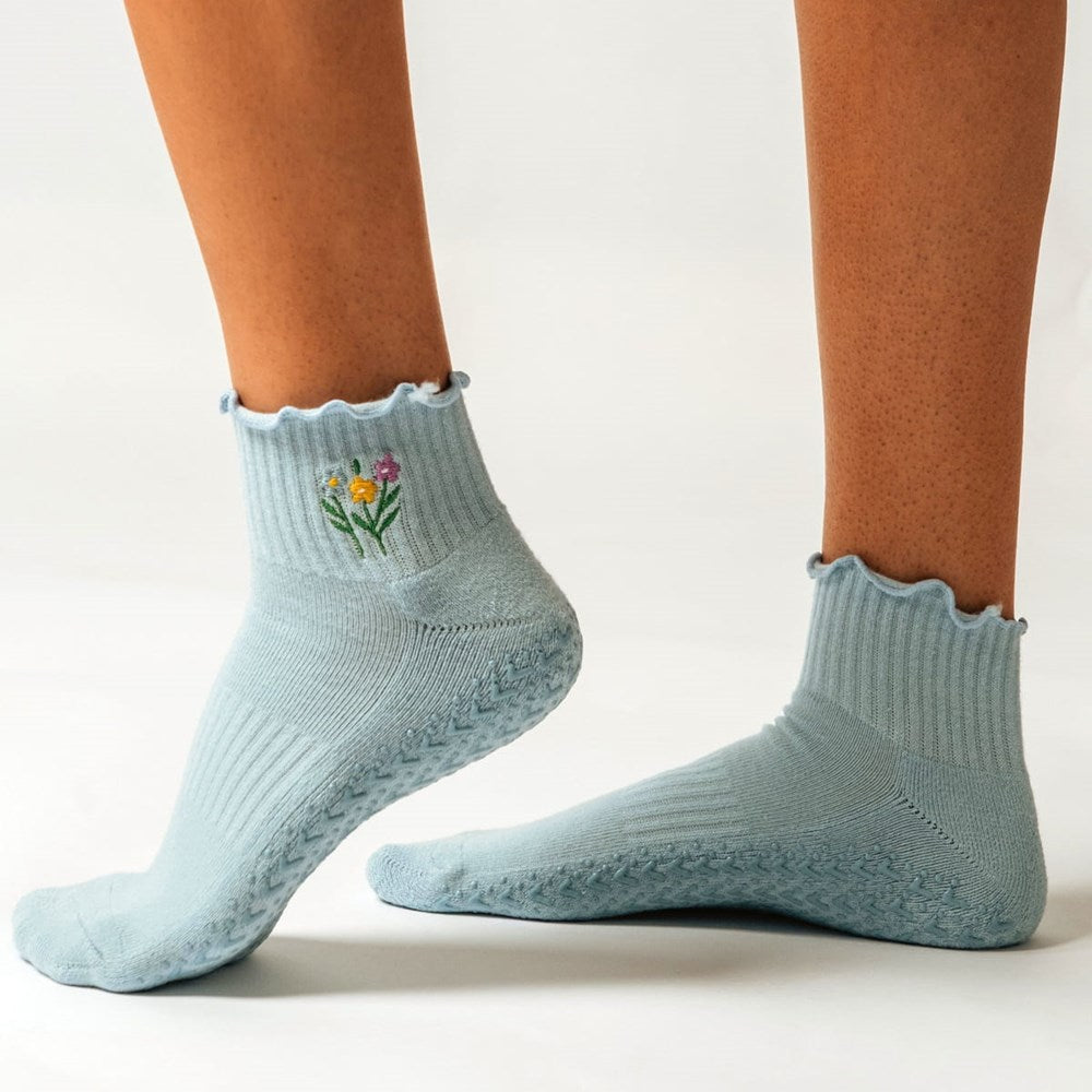 PikeFit Wildflower Grip Socks shown on feet of model (side view) - Available in S/M and M/L