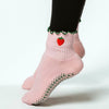 PikeFit Strawberry Shortcake Grip Socks shown on feet of model (side view) - Available in S/M and M/L