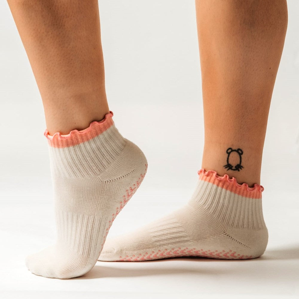 PikeFit Princess Grip Socks shown on feet of model (side view) - Available in S/M and M/L