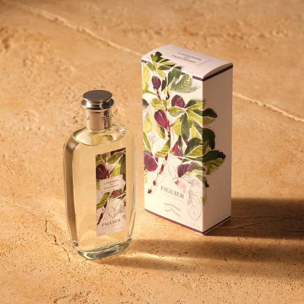 Fragonard Parfumeur Figuier (Fig Tree) Eau de Toilette (100 ml) - product shown on stone.