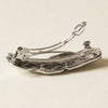 nar’sha Textured Metal Barrette Hair Clip - Silver shown from the side