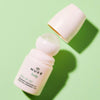 Nuxe Reve de The 24hr Fresh-Feel Deodorant (50 ml) shown with cap off to show roller ball top