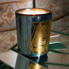 Trudon Fir Candle (9.5 oz) - product shown lit.