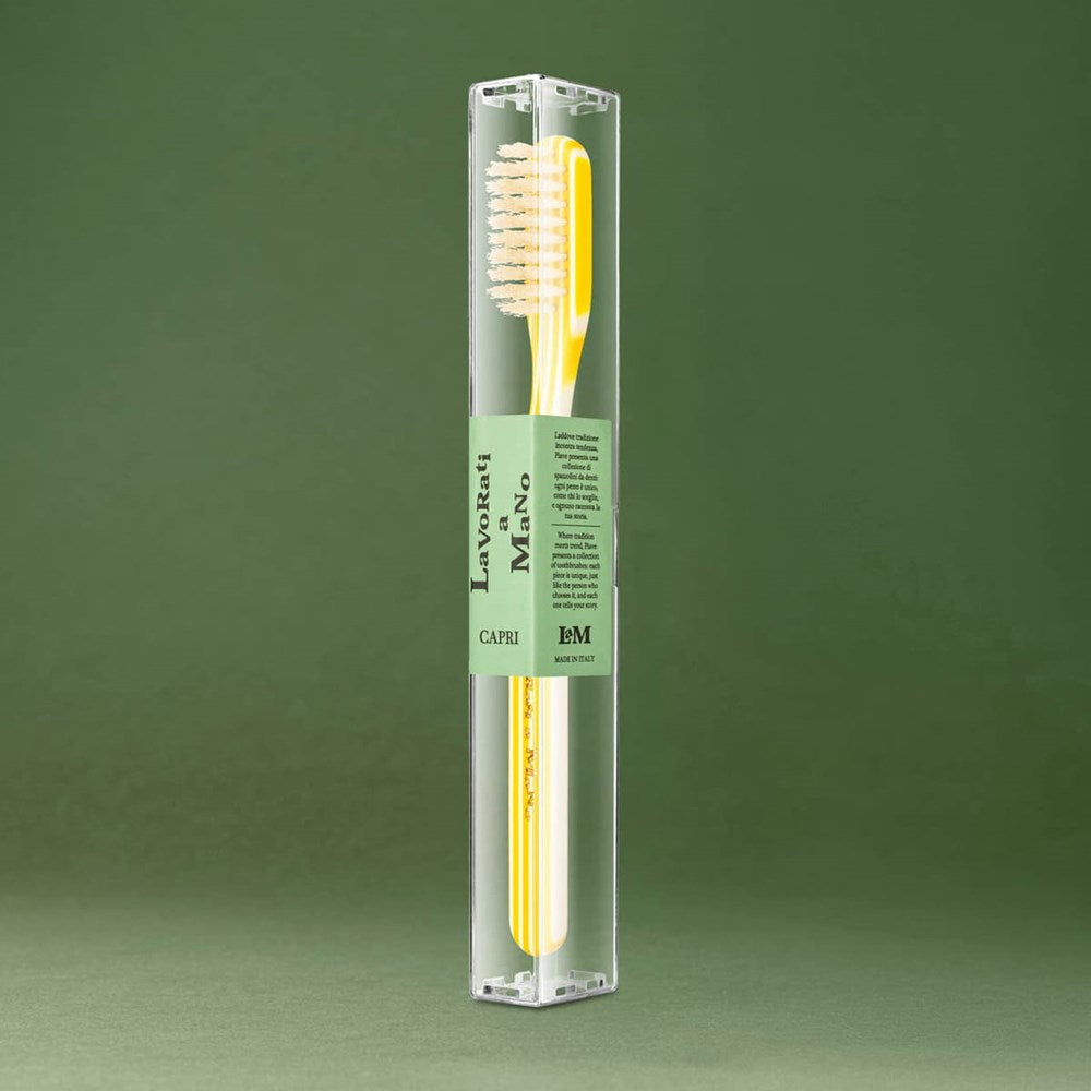 Lavorati a Mano Capri Medium Bristle Toothbrush - Yellow (1 pc) - product shown upright inside clear packaging