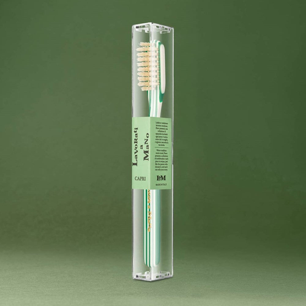 Lavorati a Mano Capri Medium Bristle Toothbrush - Green (1 pc) - product shown upright inside clear packaging