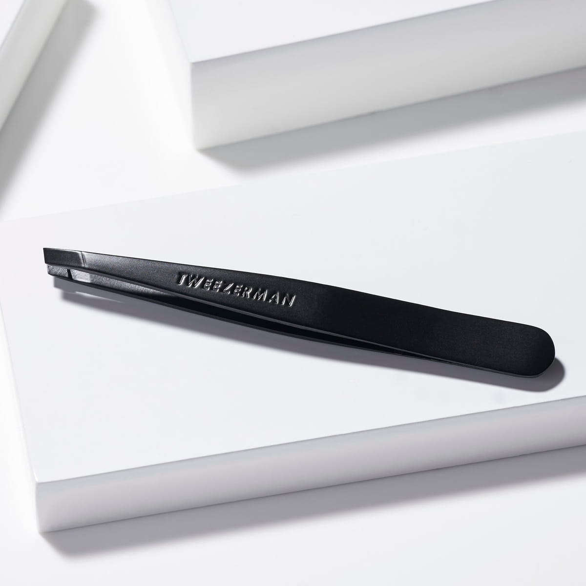 Tweezerman Slant Tweezer - Matte Black (1 pc) - product shown on side 