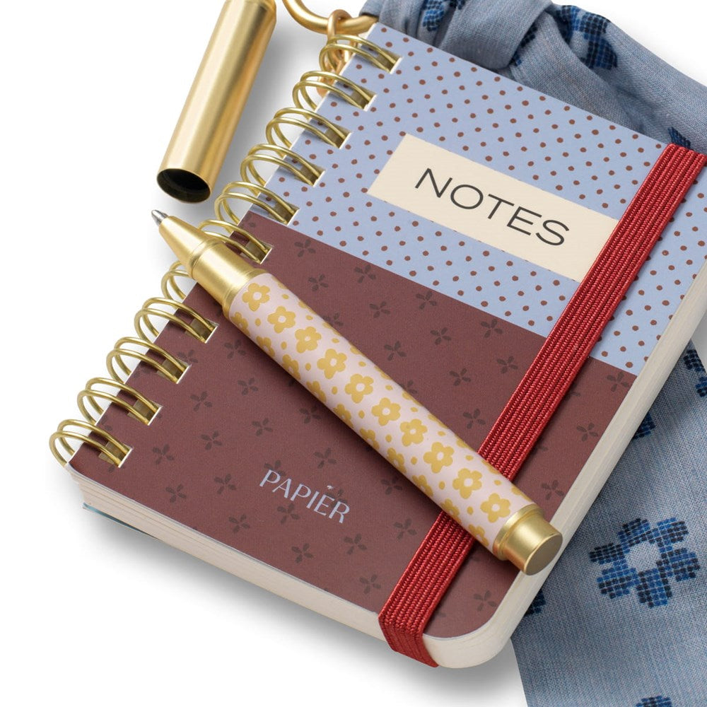 Close up of Papier Pocket Notes Charm (1 pc) showing pen with cap off