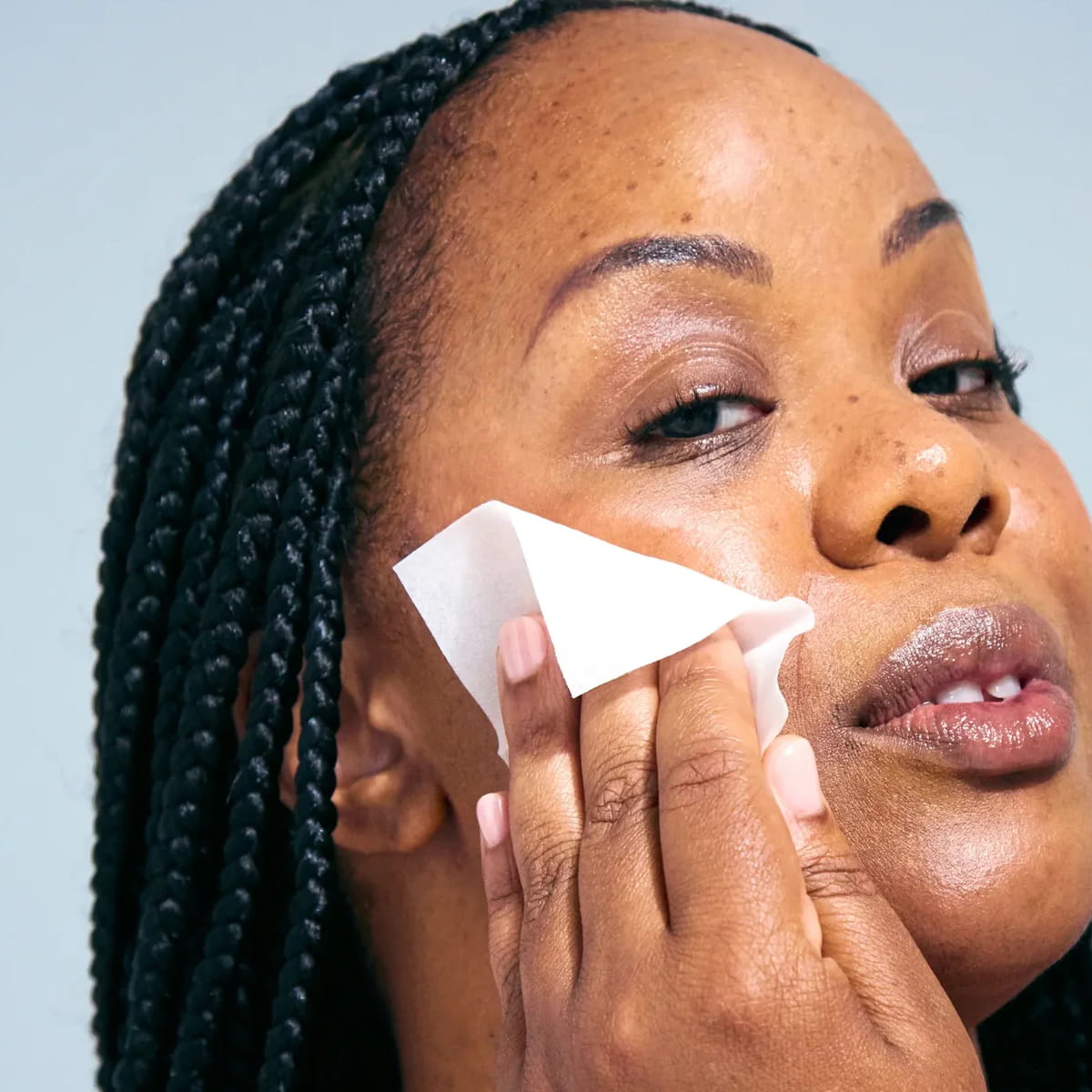 Wrinkles Schminkles Face, Neck &amp; Decolletage Peel Pads (5 pcs) - product shown being used on face 