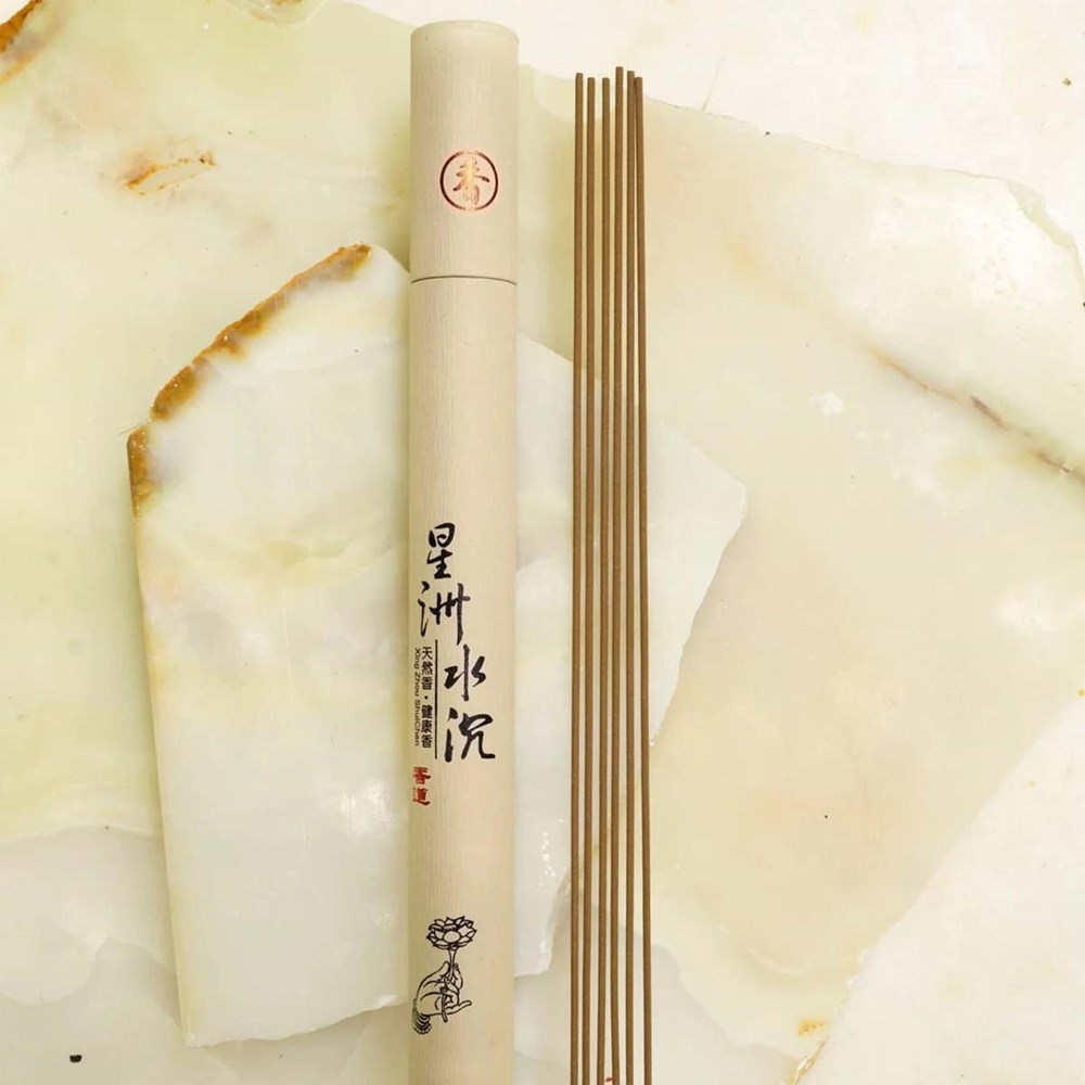 Even Keel Arbor Vitae Incense (60 sticks) shown on a white and beige marble background.