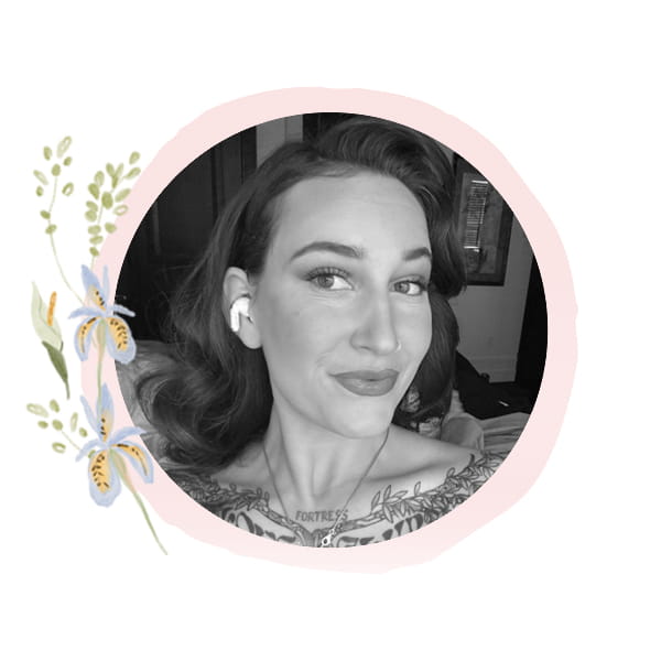 Headshot of Staff Member Sam with seasonal art frame