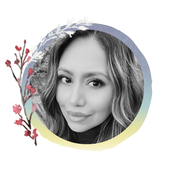 Headshot of Staff Member Janet with seasonal art frame